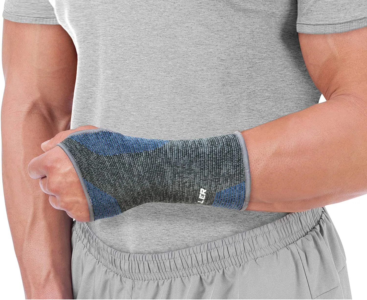 Mueller Sports Medicine 4-Way Stretch Premium Knit Wrist Support bandáž na zápěstí Velikost: S/M