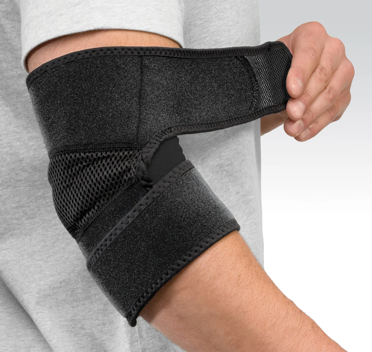 Mueller Sports Medicine Adjustable Elbow Support, bandáž na loket 