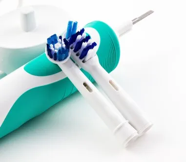 Elektrické zubní kartáčky, ústní sprchy